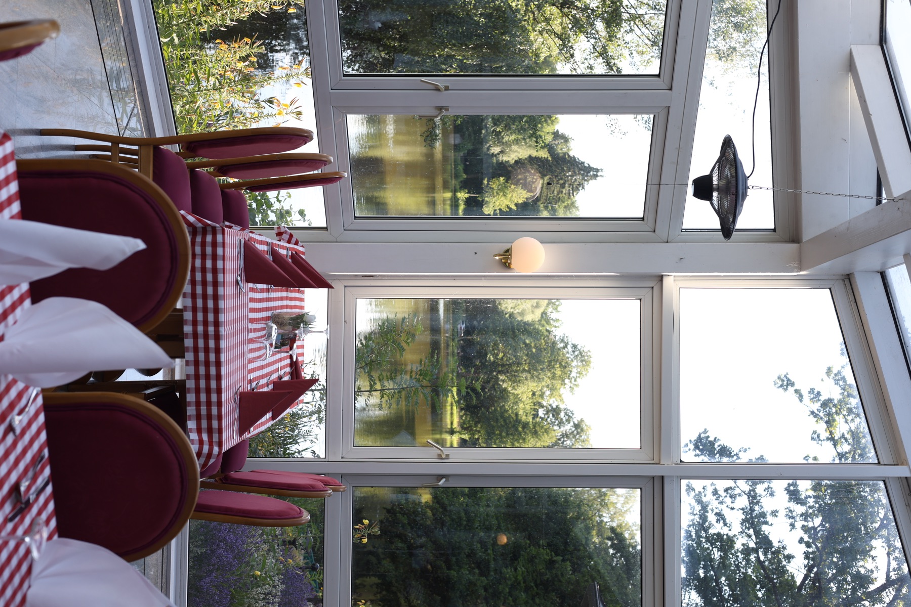 Gondelfahrt dining table by the lake-facing windows